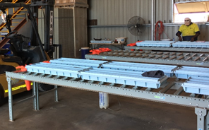 Core trays placed parallel along the roller racking