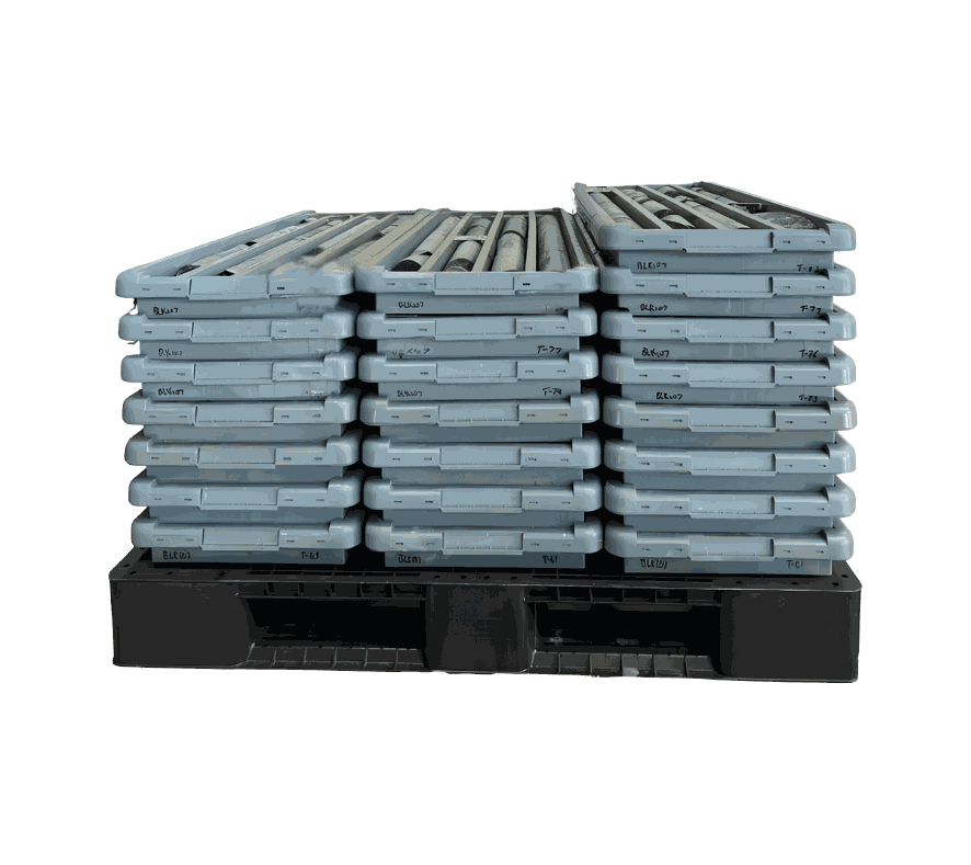 Stacked core trays on a transport pallet